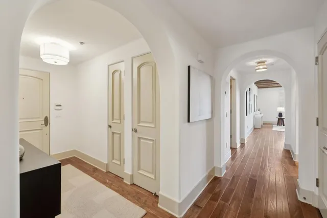 a bathroom with a shower sink and mirror