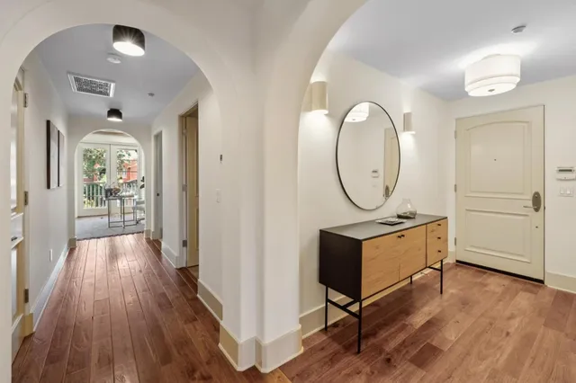 a living room with furniture a window and a fireplace