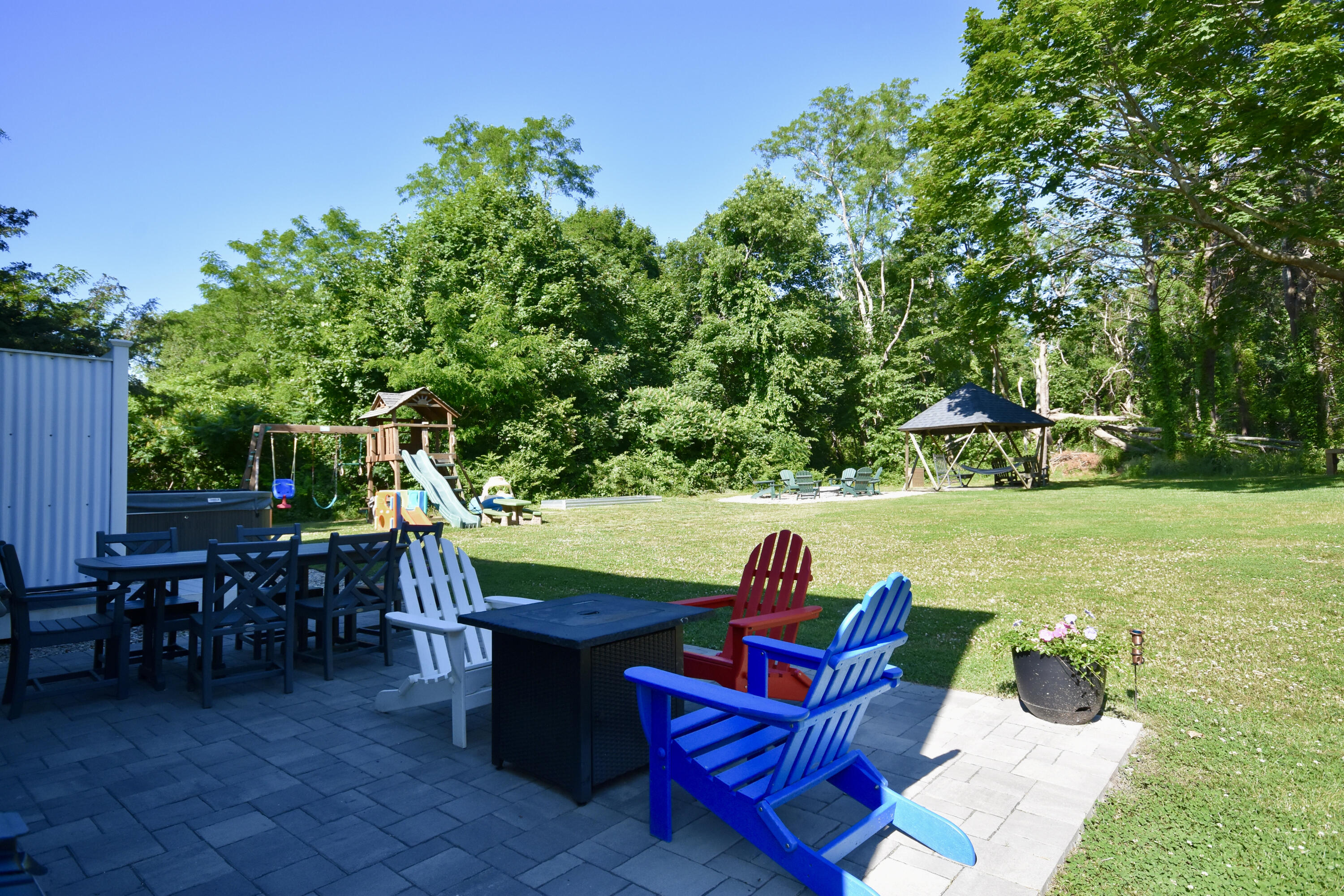 15 Swift Road Sagamore Beach, MA 02562 - Photo 23 of 29 a view of a chairs and table in the patio