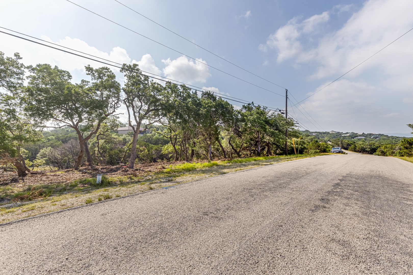 1252 Parton Road Canyon Lake, TX 78133 - Photo 2 of 11 a view of a house with a street