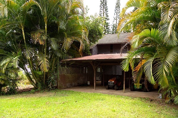 44-3173 Kalaniai Road Honokaa, HI 96727 - Photo 8 of 15 a view of a house with a yard and sitting area