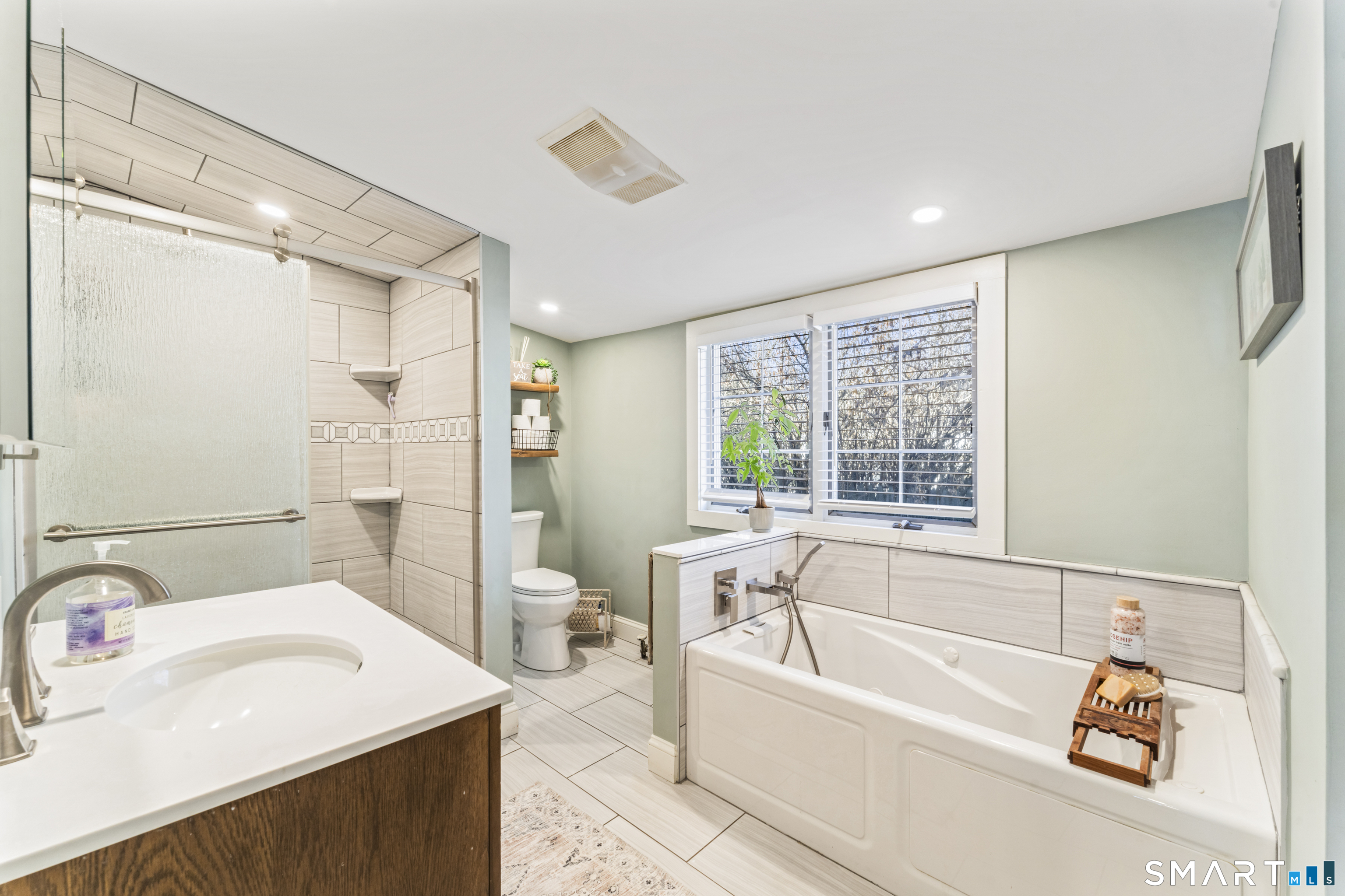 5 Hampton Road New Fairfield, CT 06812 - Photo 22 of 30 a bathroom with a bathtub a sink a mirror and a shower