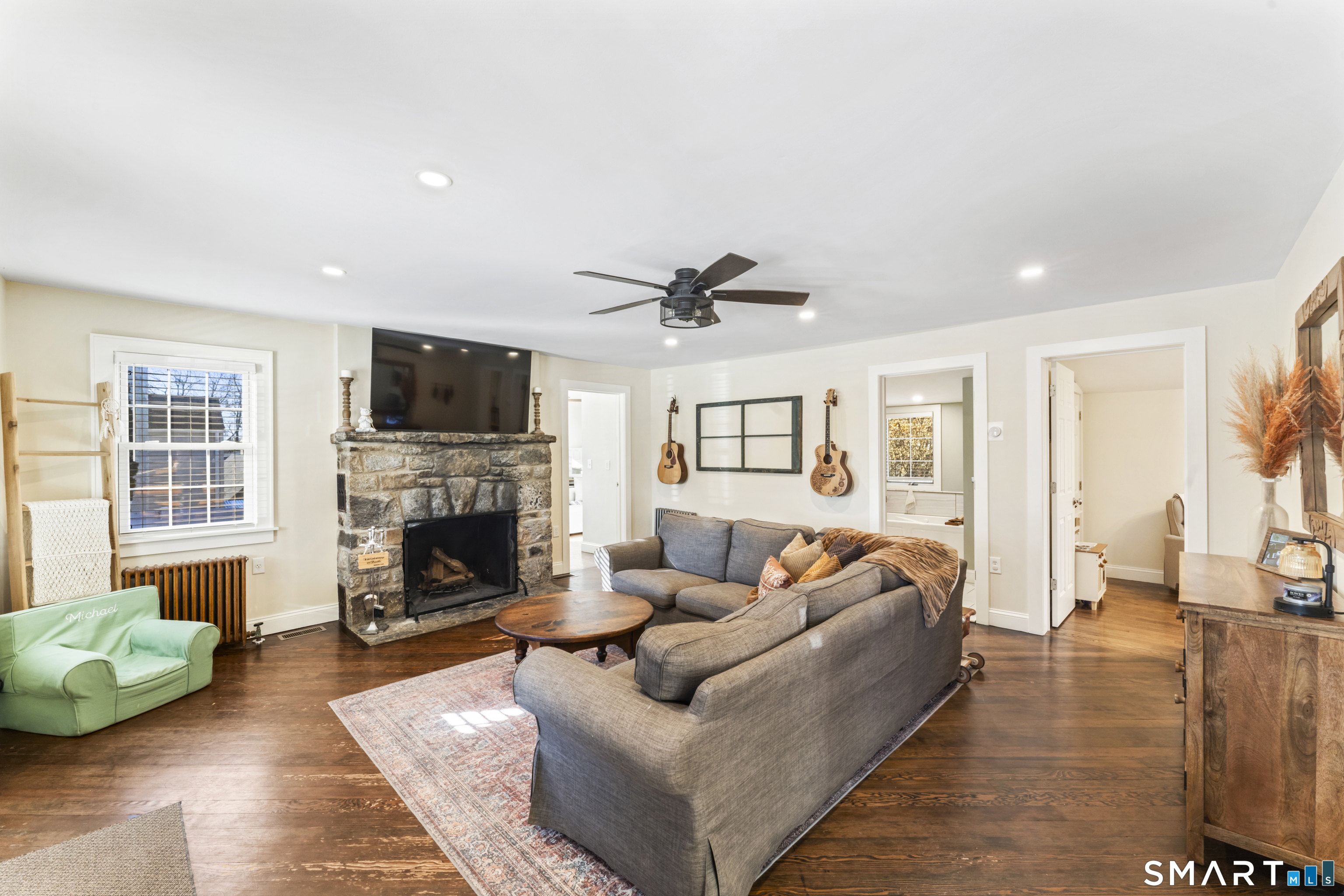5 Hampton Road New Fairfield, CT 06812 - Photo 4 of 30 a living room with furniture and a fireplace