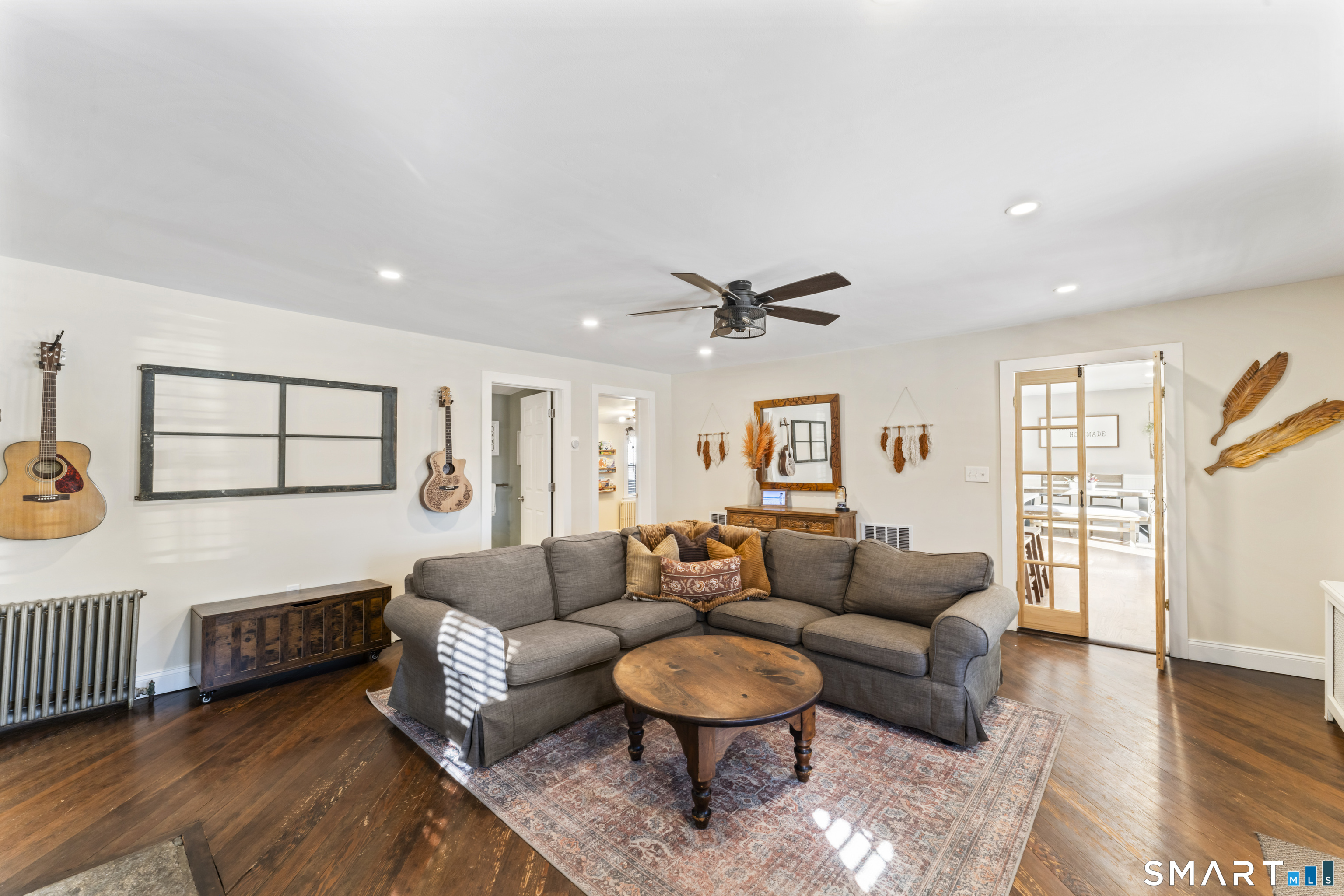 5 Hampton Road New Fairfield, CT 06812 - Photo 8 of 30 a living room with furniture and a wooden floor