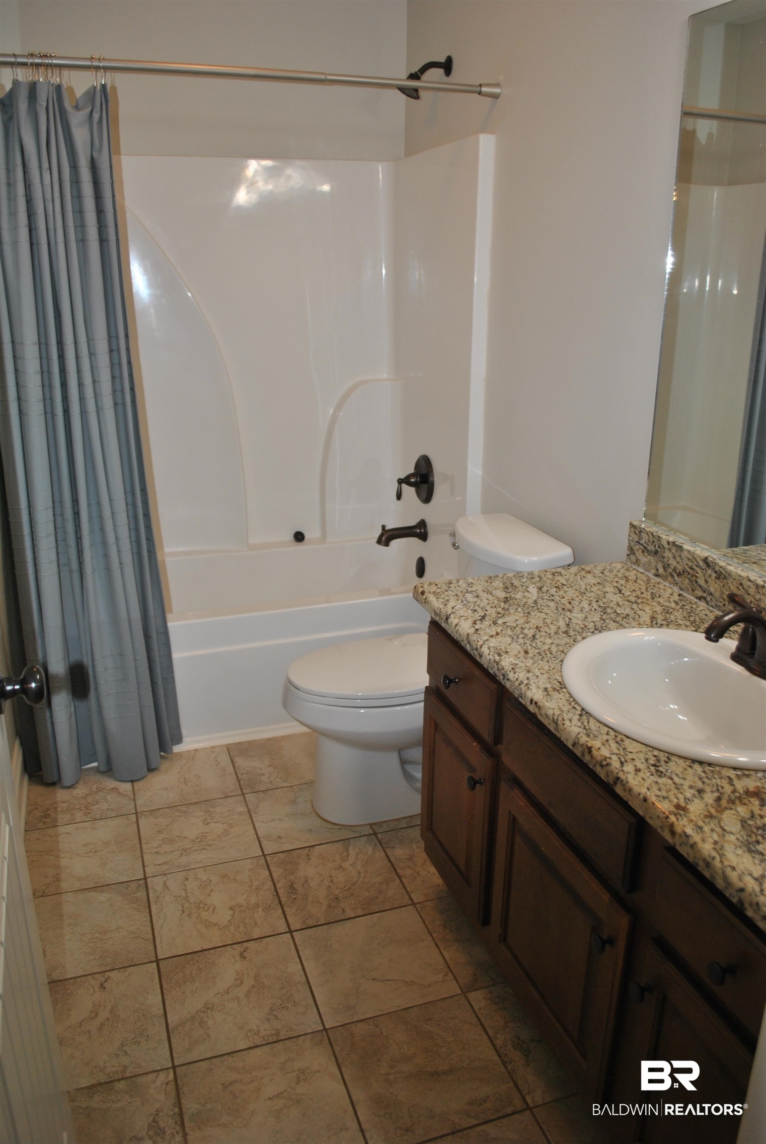 2161 Spring Grove West Mobile, AL 36695 - Photo 23 of 31 Bathroom featuring vanity and shower / bath combination with curtain