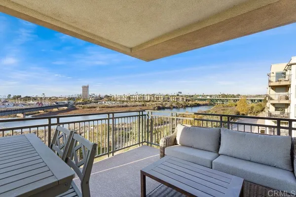 a view of a balcony with city view