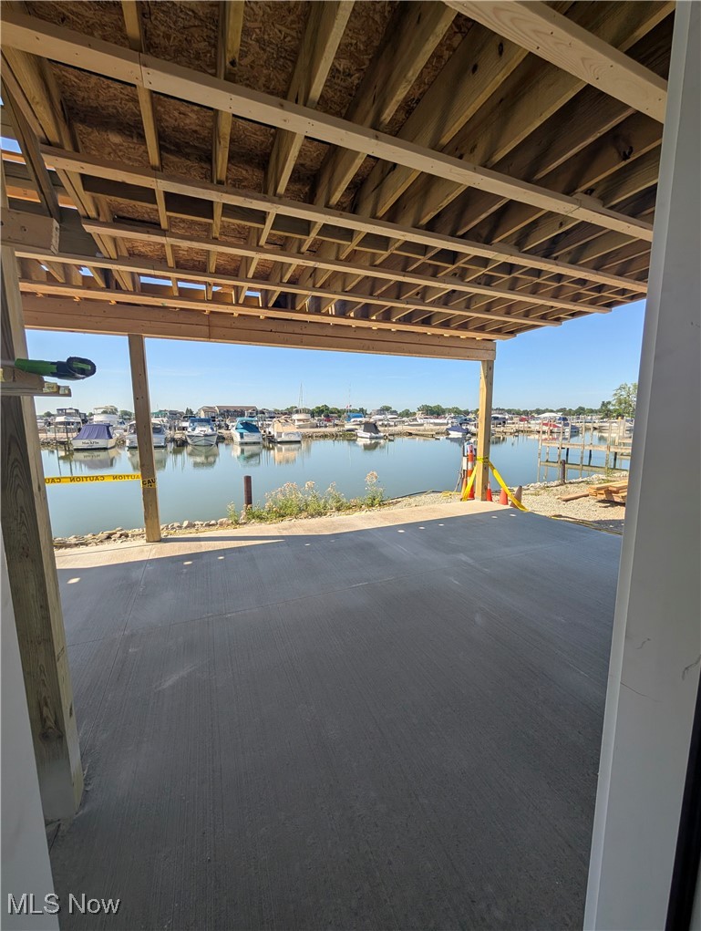 1963 Northeast Catawba Road, Unit 431 Port Clinton, OH 43452 - Photo 7 of 9 View of patio featuring a water view