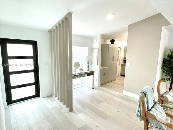 a view of livingroom with furniture and window