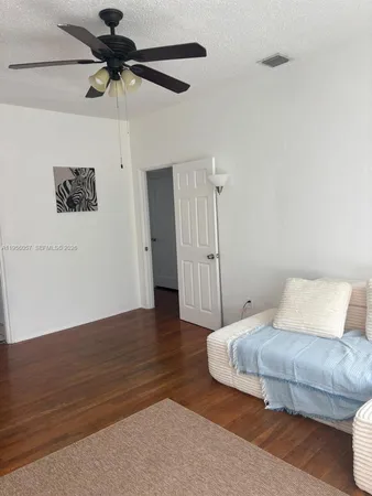 a utility room with a window and a sink