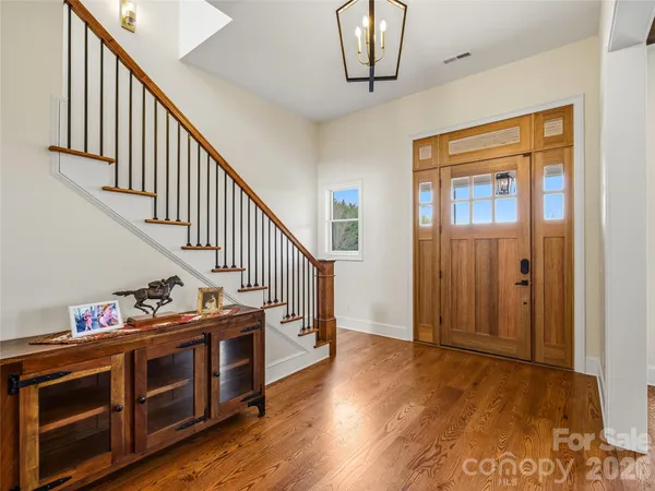 a view of an entryway with hardwood