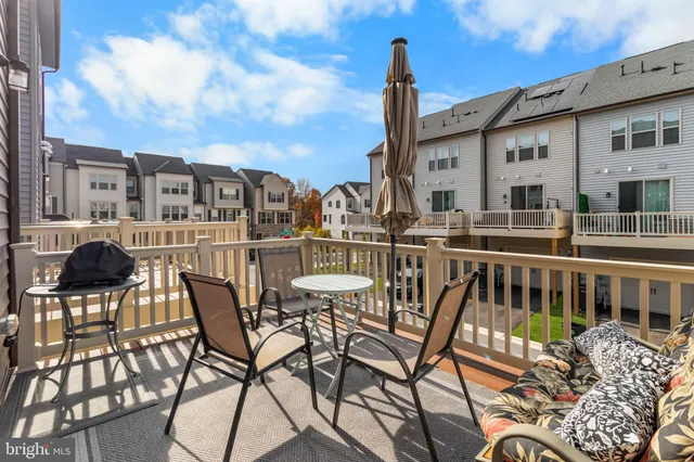 a front view of a house with a yard and porch