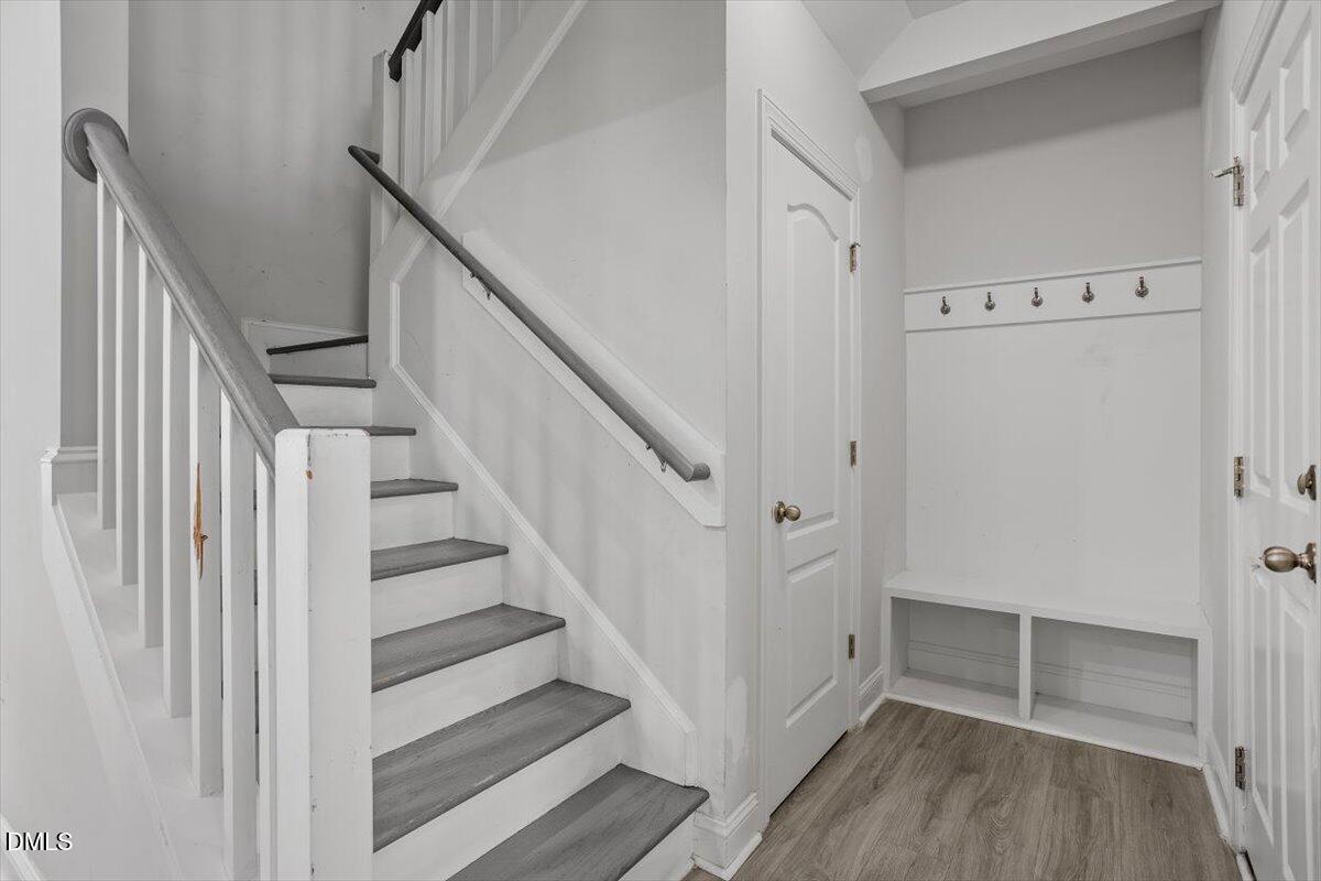 114 Stephens Timberline View Clayton, NC 27520 - Photo 30 of 43 a view of a hallway with wooden floor and entryway