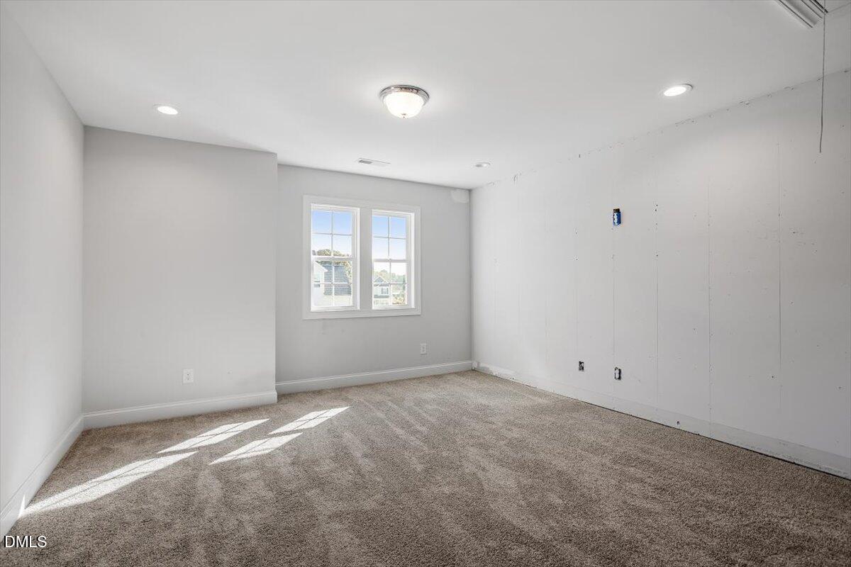 114 Stephens Timberline View Clayton, NC 27520 - Photo 37 of 43 an empty room with windows