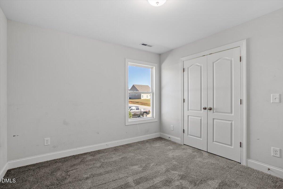 114 Stephens Timberline View Clayton, NC 27520 - Photo 40 of 43 a view of an empty room and window