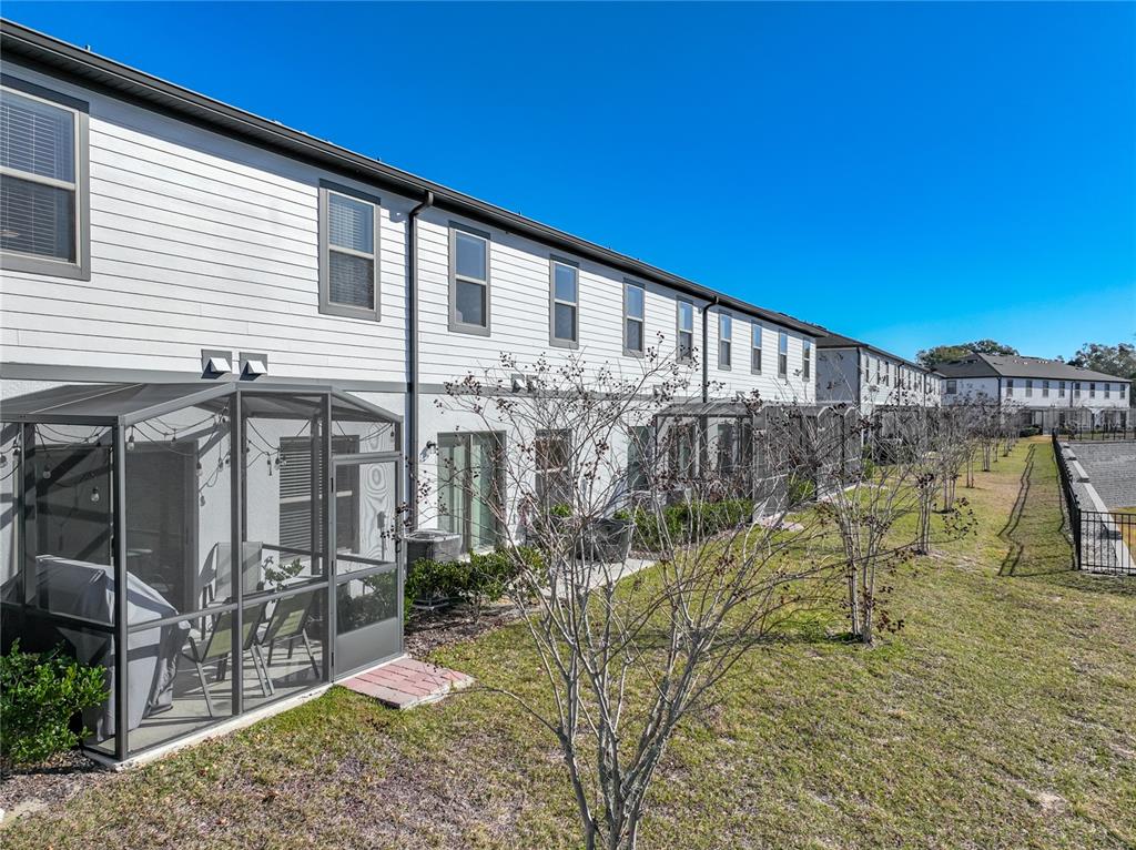 381 Smugglers Way Apopka, FL 32712 - Photo 47 of 53 a front view of a house with garden