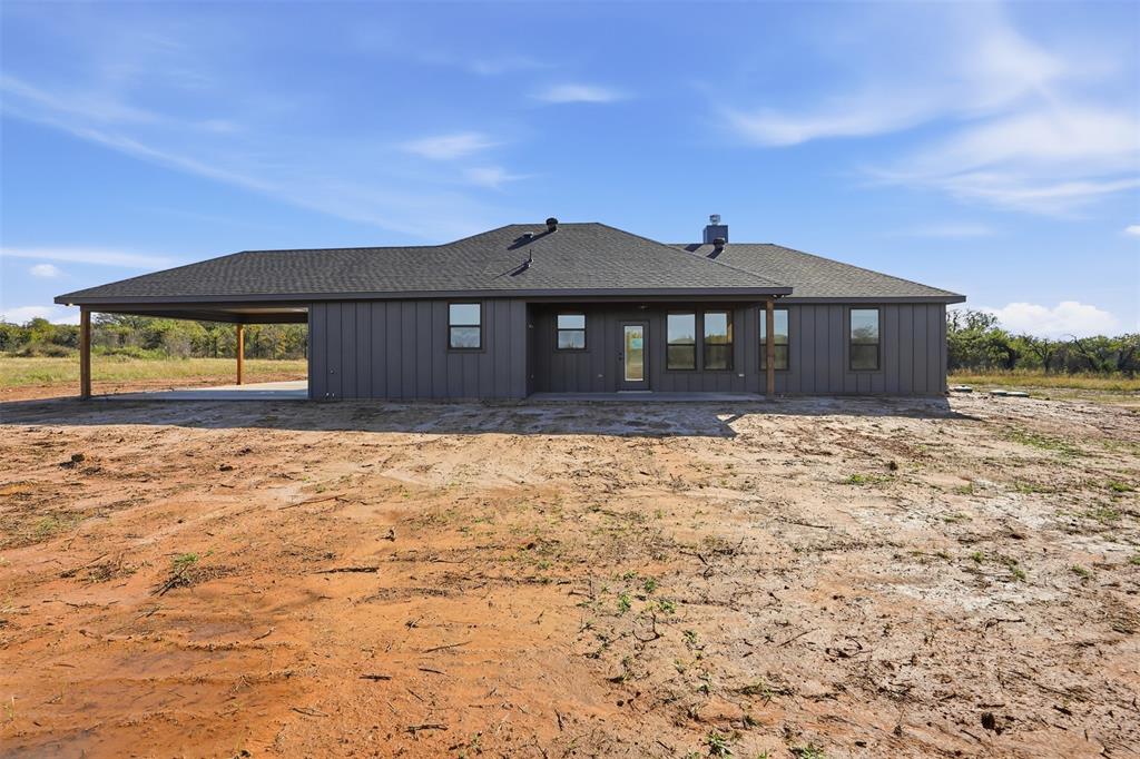 1865 Dobbs Valley Road Mineral Wells, TX 76067 - Photo 30 of 37 a front view of a house with a yard