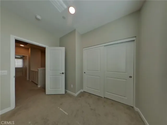 wooden floor and closet in a room