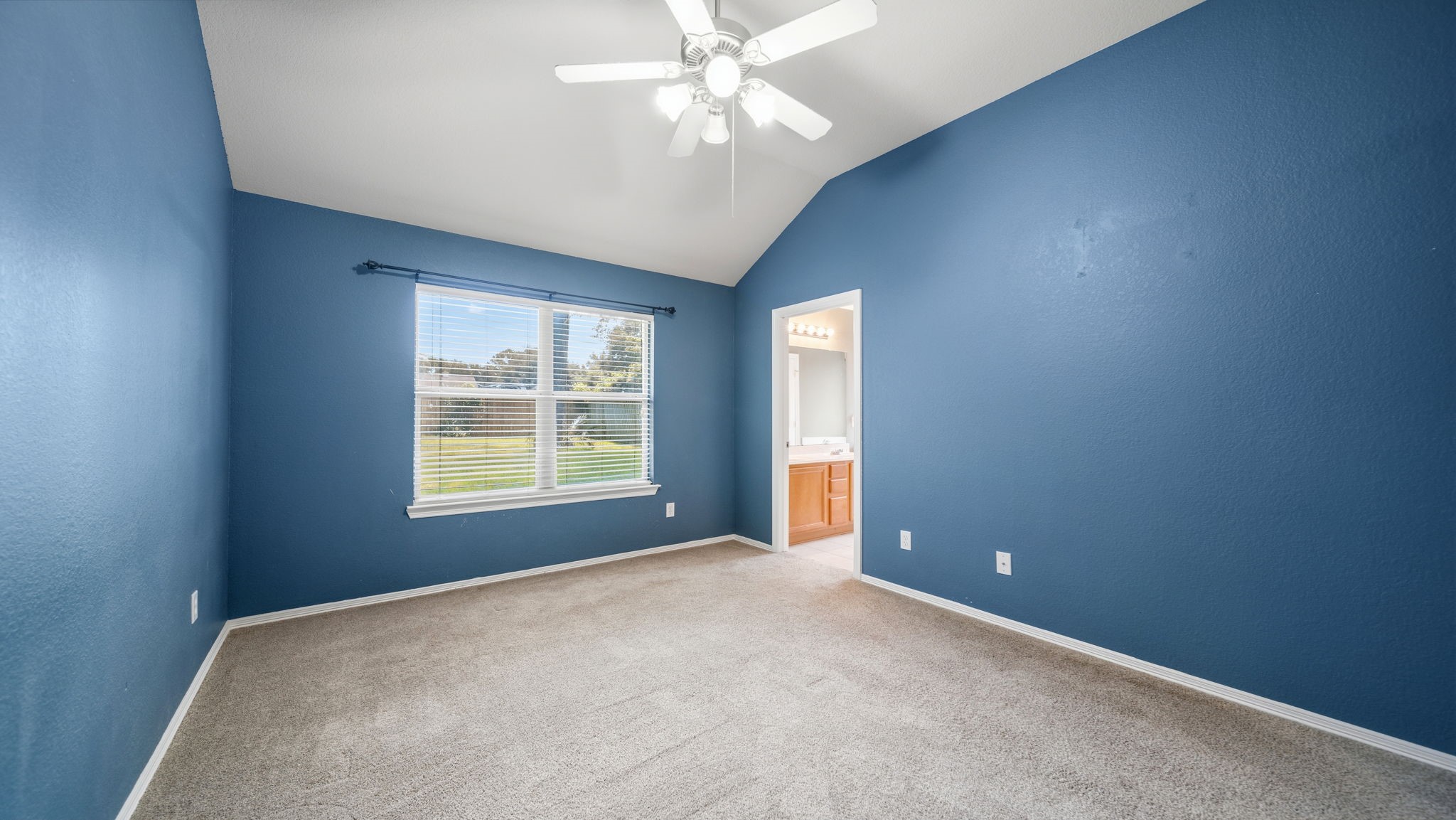 213 Mesa View Conroe, TX 77316 - Photo 11 of 19 a view of an empty room with a window