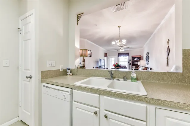 a bathroom with a sink a mirror and a toilet