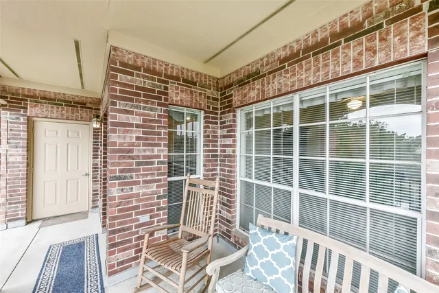 a workspace with furniture and window