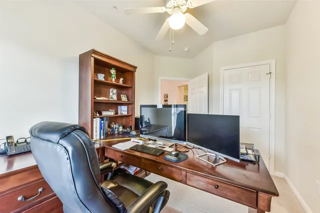 a spacious bathroom with a double vanity sink toilet and a tub