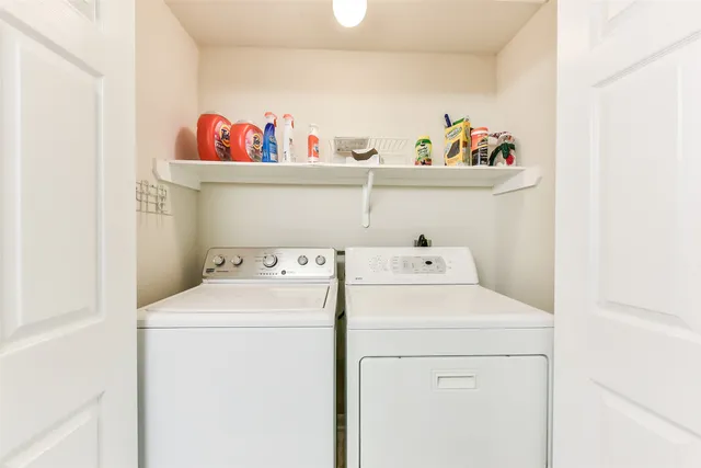 a bedroom with bed and window