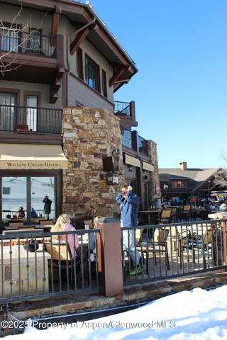 a front view of building with outdoor seating