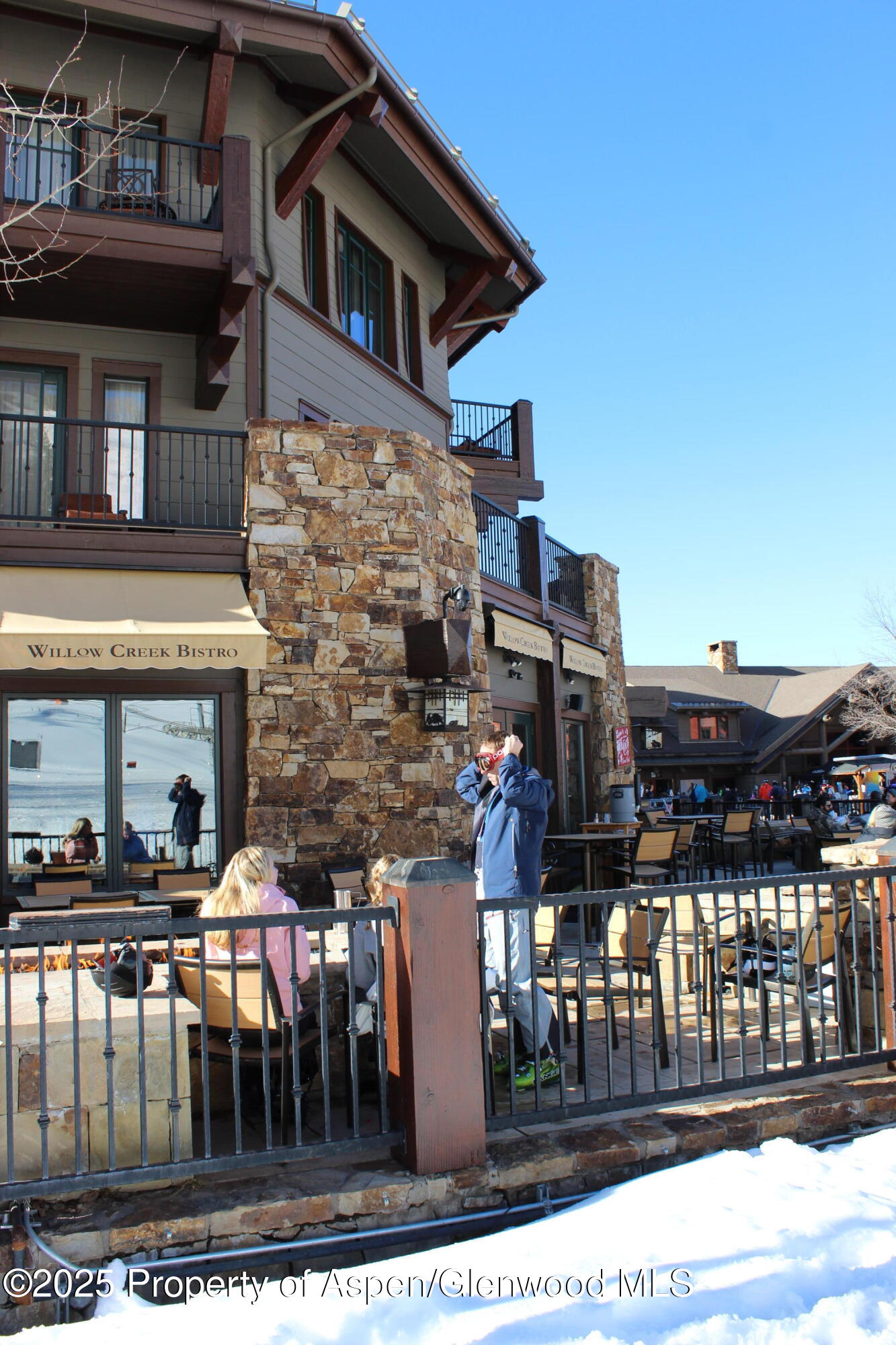 a front view of building with outdoor seating