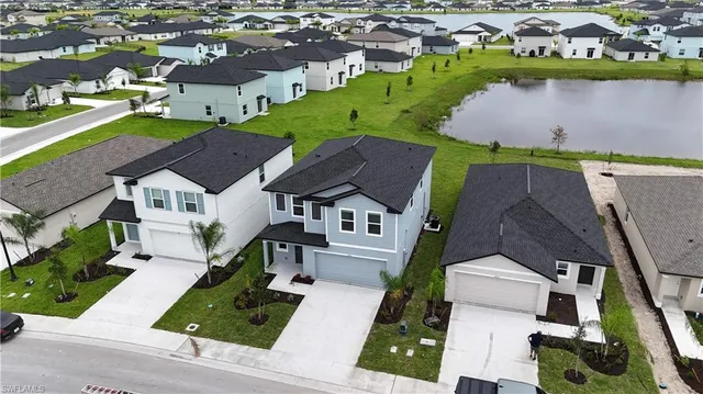 an aerial view of a house with a garden