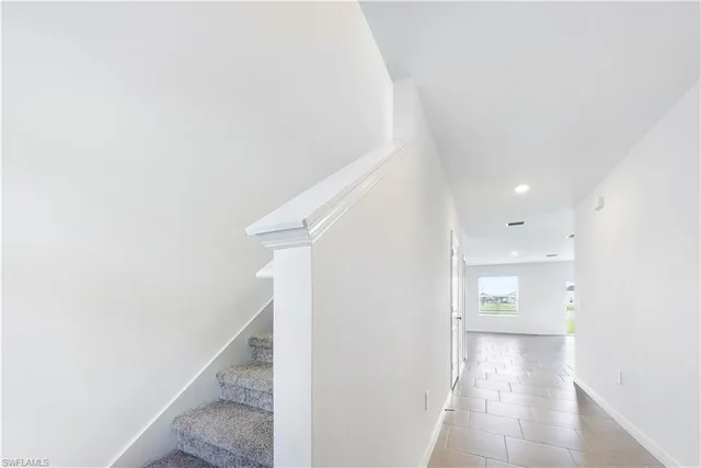 a view of a hallway with entryway