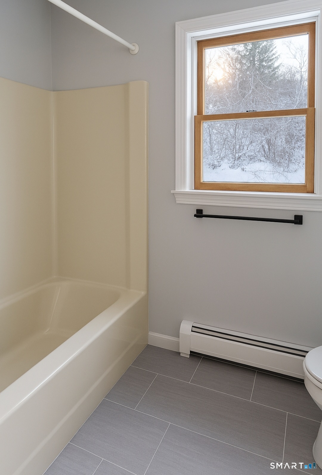 316 High Road Berlin, CT 06037 - Photo 11 of 20 a bathroom with a window and a bathtub
