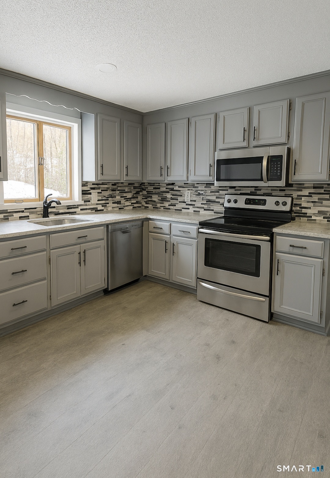 316 High Road Berlin, CT 06037 - Photo 7 of 20 a kitchen with stainless steel appliances granite countertop a stove top oven a sink dishwasher and a refrigerator