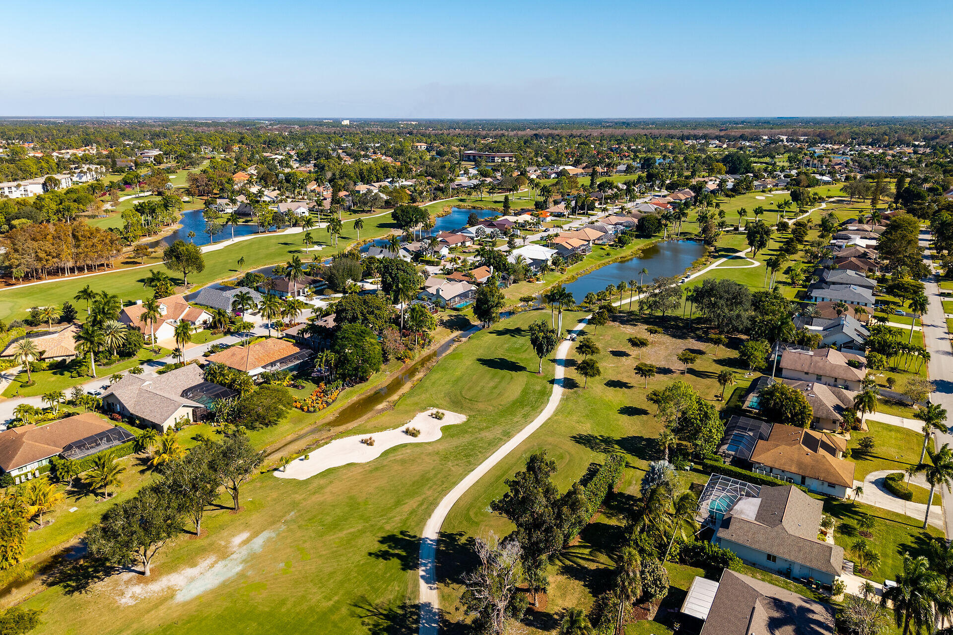 178 Torrey Pines Naples, FL 34113 - Photo 40 of 48 an aerial view of residential building and ocean