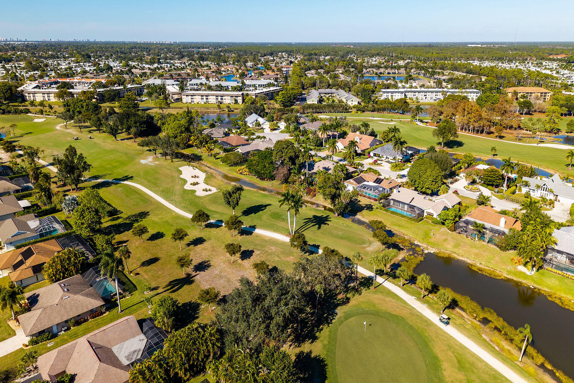 178 Torrey Pines Naples, FL 34113 - Photo 42 of 48 an aerial view of residential houses with outdoor space
