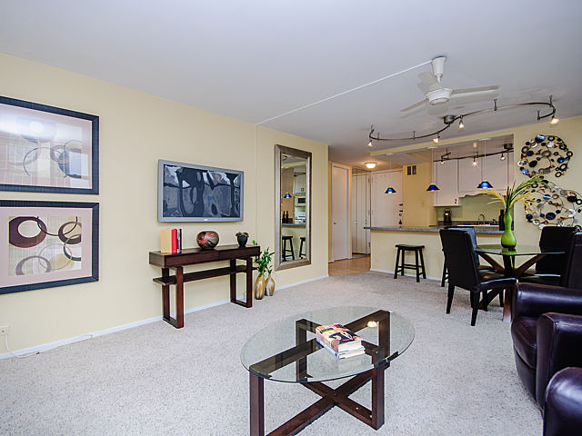 1 East Scott Street, Unit 604 Chicago, IL 60610 - Photo 4 of 11 a living room with furniture
