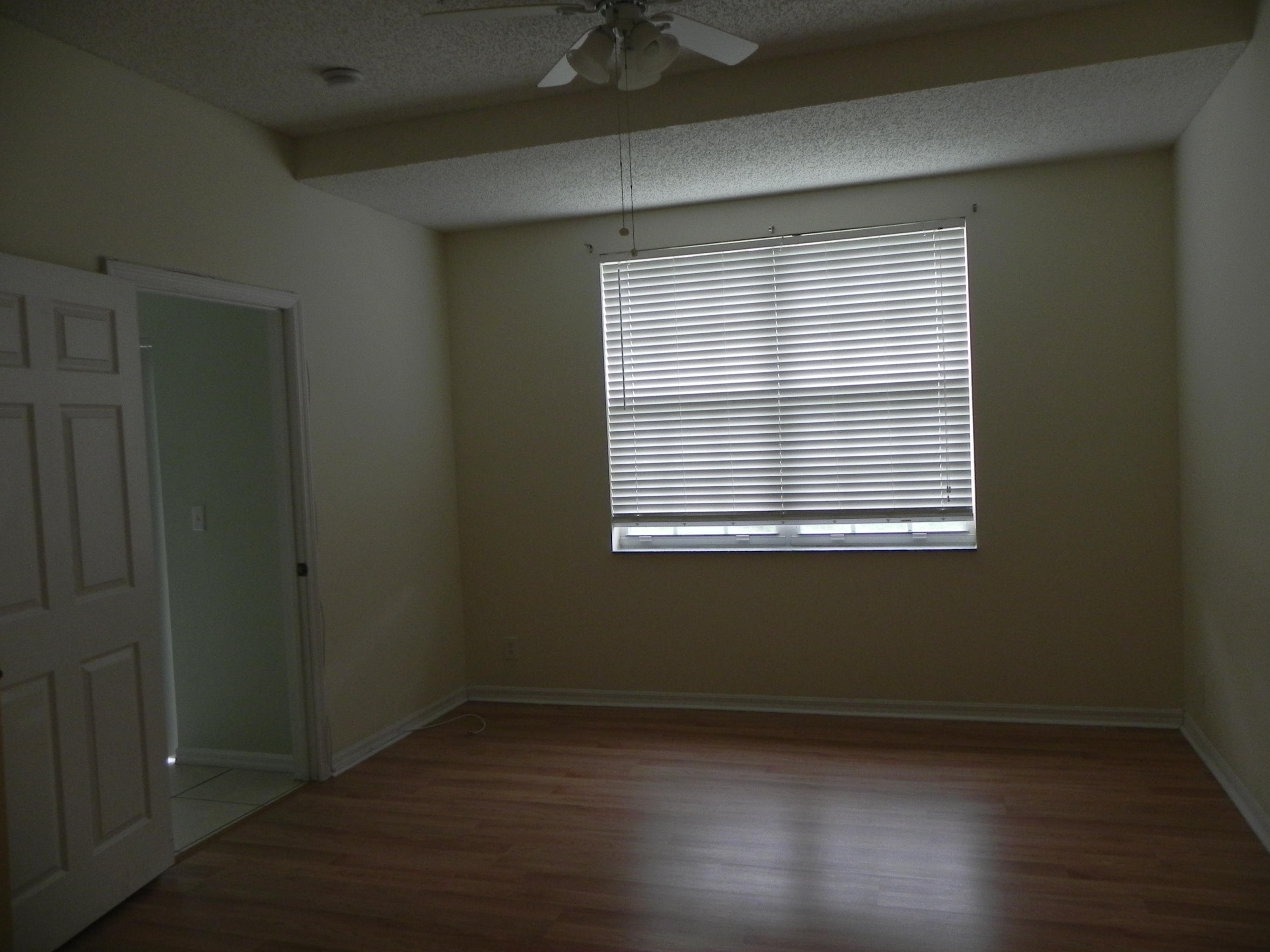 102 Lighthouse Circle, Unit A Tequesta, FL 33469 - Photo 6 of 12 (9)102A Master Bedroom