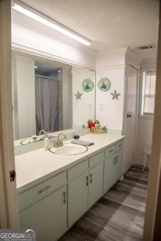 a view of front door with wooden floor