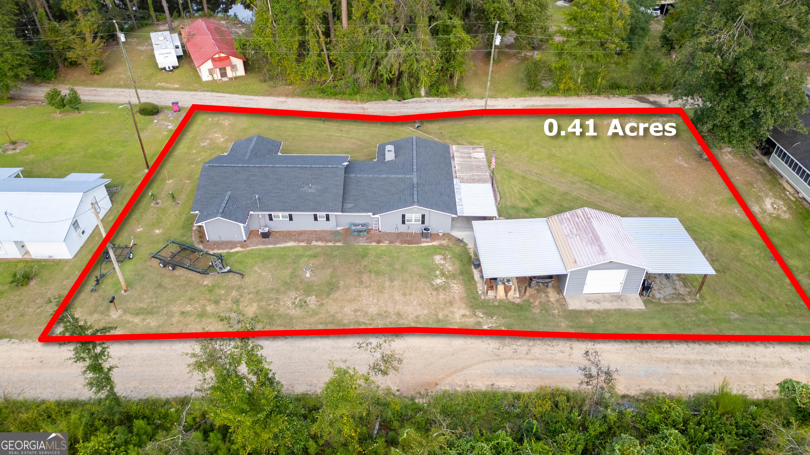 1758 Easons Bluff Road Baxley, GA 31513 - Photo 50 of 50 a view of swimming pool with a garden and plants