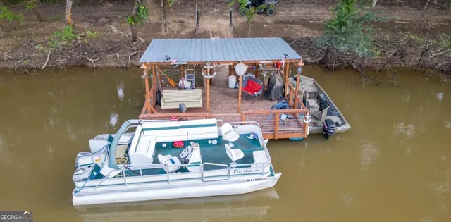 a view of table and chairs in patio
