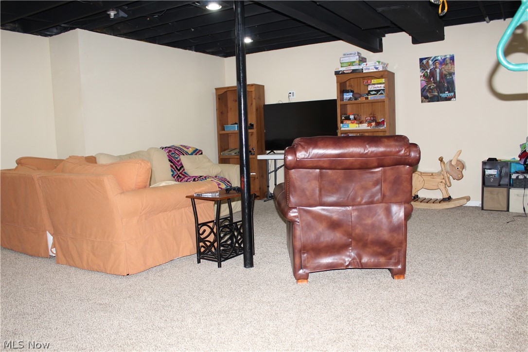 4480 Leewood Road Stow, OH 44224 - Photo 11 of 26 The "hang out" side of the finished basement is a perfect game room, hang-out space!~
