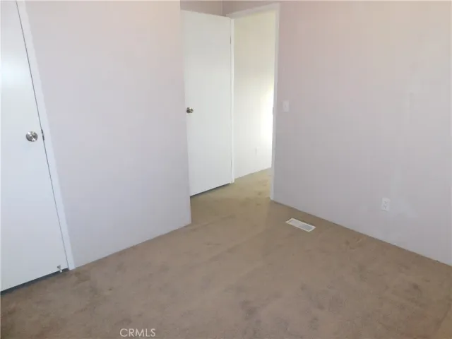a white toilet sitting next to a bath tub shower