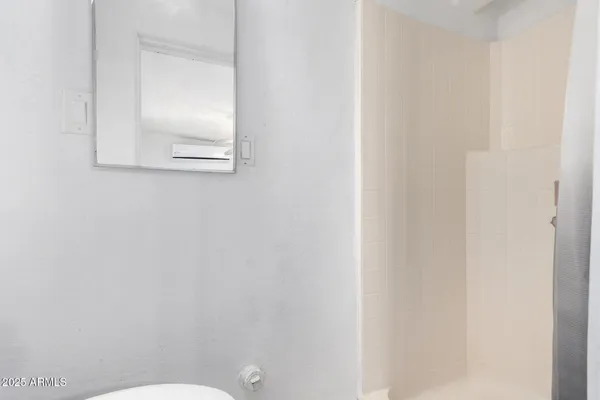 a bathroom with a toilet