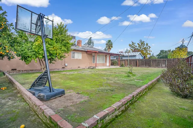 a view of a backyard with a garden