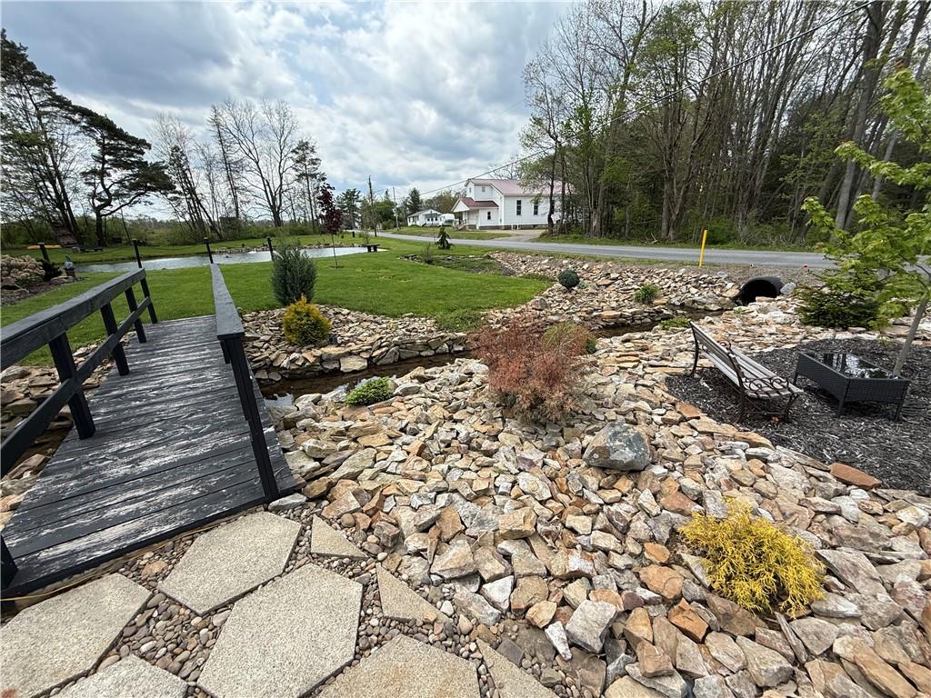 1417 Pine Flats Road Clymer, PA 15728 - Photo 17 of 22 a view of a backyard with wooden fence