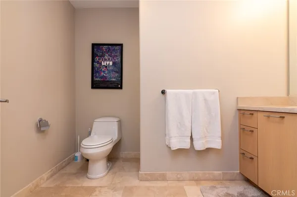 a bathroom with a toilet sink and tub
