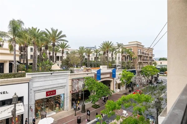 a view of multiple houses with a street