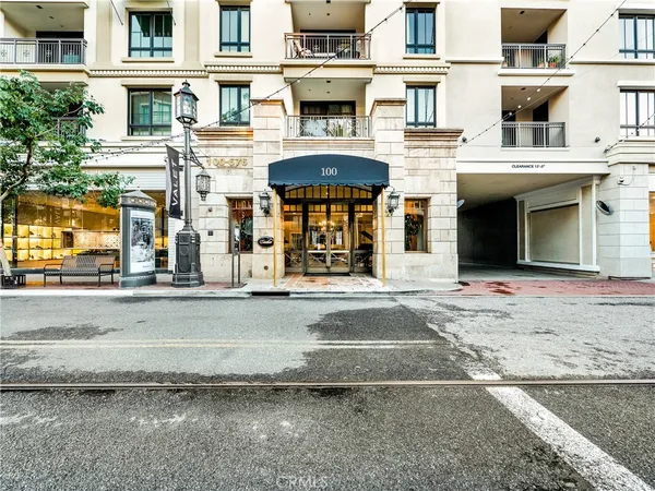 a front view of a building and a street
