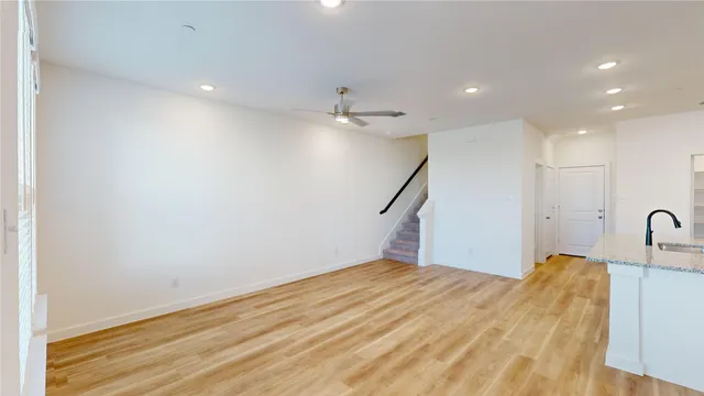 a view of a livingroom with a staircase