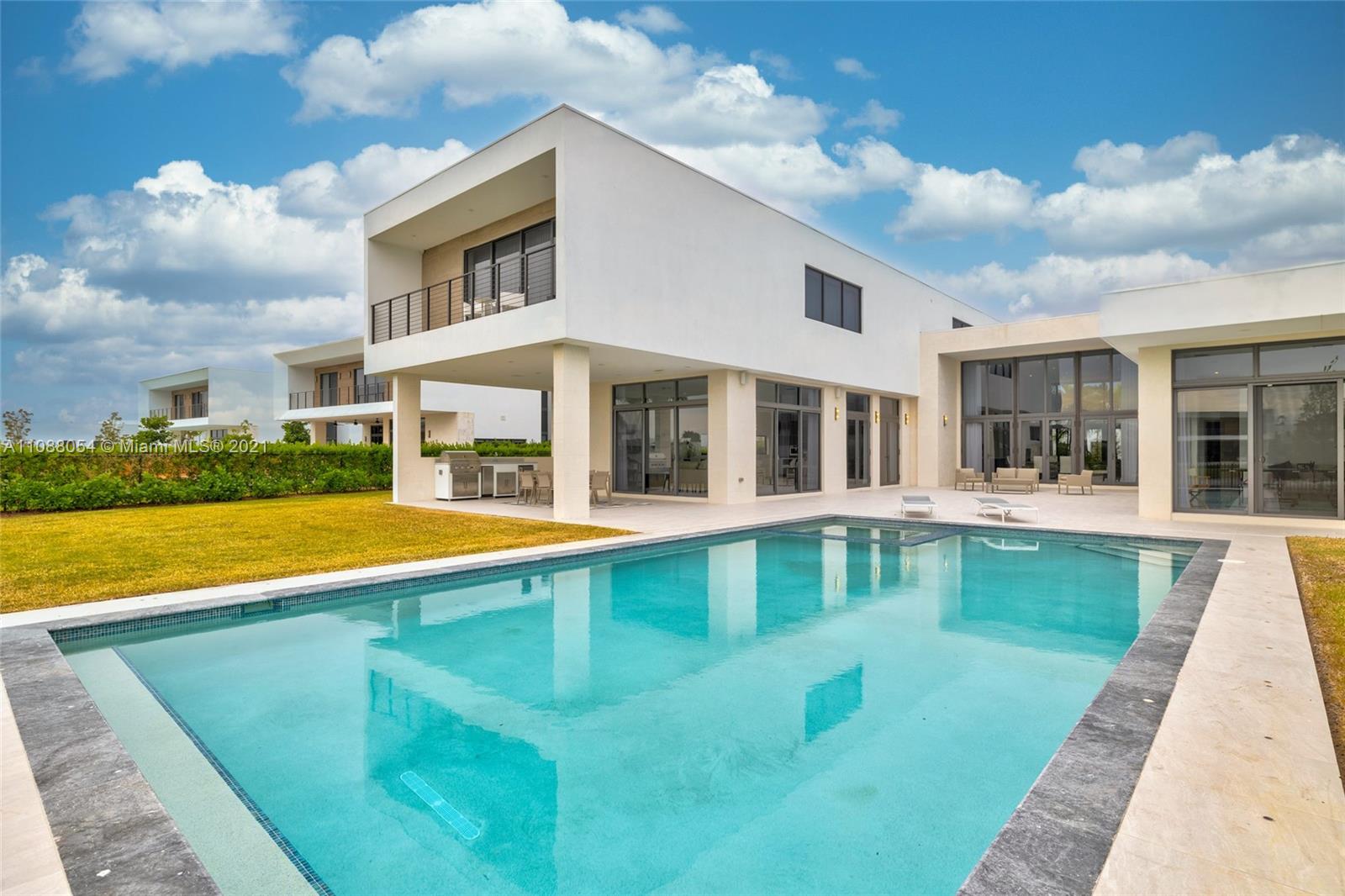 16610 Sunset Way Weston, FL 33326 - Photo 1 of 35 a view of house with swimming pool and yard