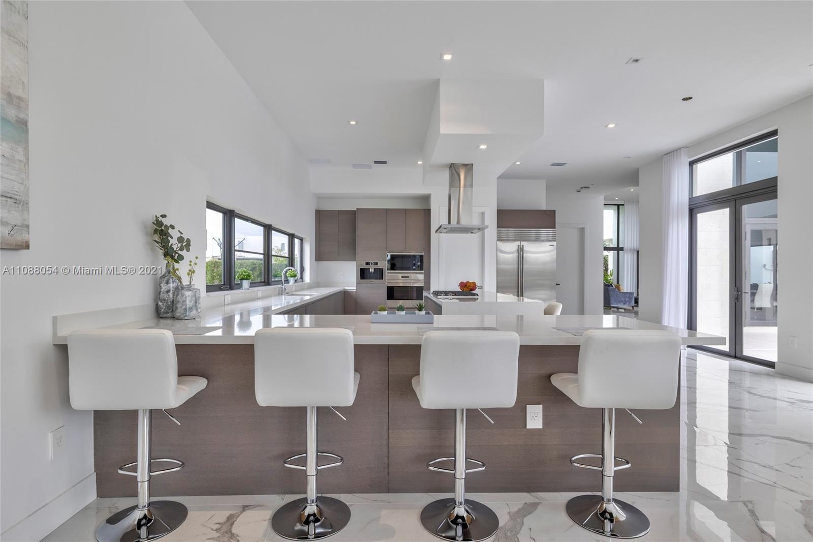 16610 Sunset Way Weston, FL 33326 - Photo 13 of 35 a living room with furniture and a table